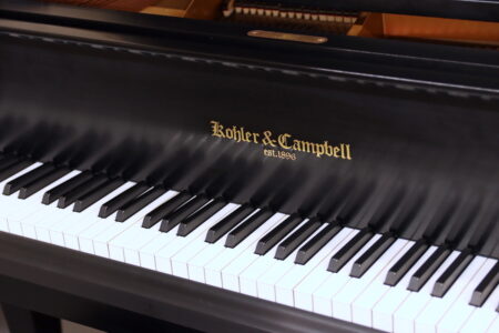 Pre-Owned Kohler & Campbell model KCG-600D, fallboard decal