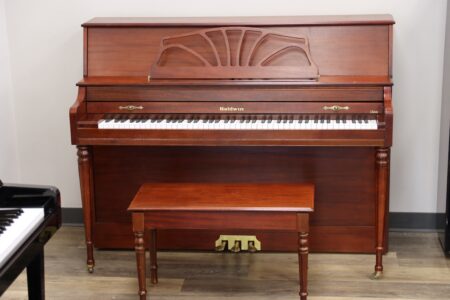Pre-Owned Baldwin 660 console upright piano | PianoWorks | satin mahogany