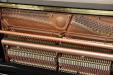 view of strings & action, pre-owned Hailun H-5P upright piano