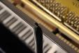 top view of sound port in 3-piece top panel on Yamaha YU30 upright piano
