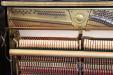 inside pre-owned Yamaha U30A upright piano, bass hammers and strings
