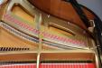 Pre-Owned Story & Clark piano, model 185C, view of plate and treble strings